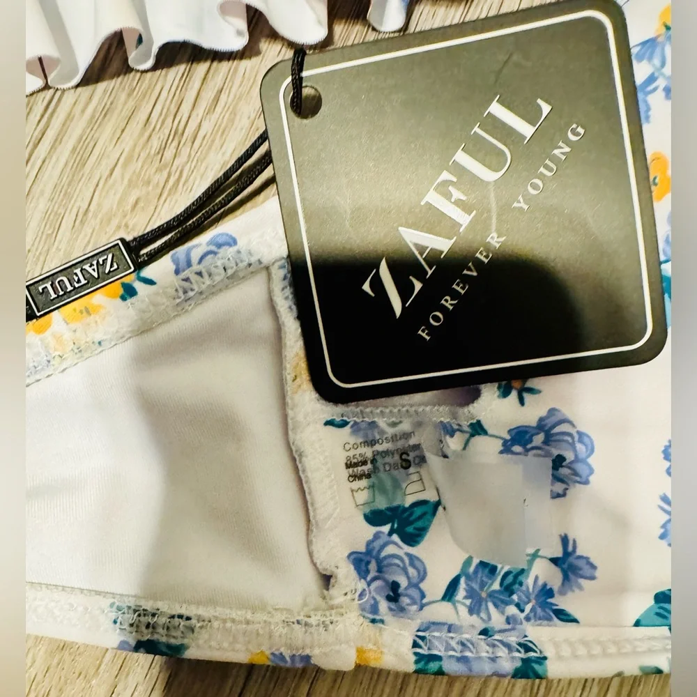 Zaful. This modern women's swimsuit, size S, features a tummy-flattering effect